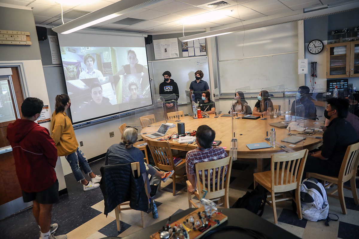 Design thinking students present their final projects.