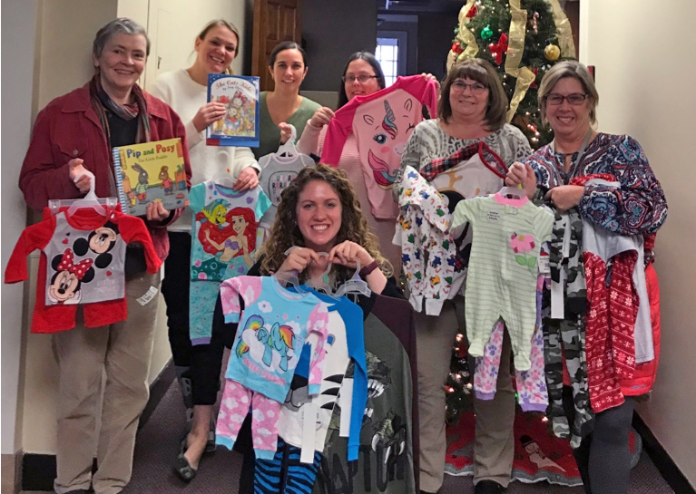 Exeter Finance Department with PJs for tots.