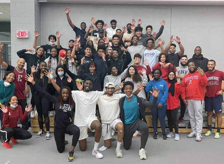 Members of Athletes for Racial Justice and leaders from OMA pose for a photo.