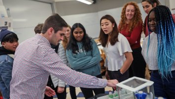Instructor Andrew McTammany leads a chemistry class