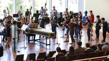 Members of Exeter's Chamber Orchestra perform with A Far Cry